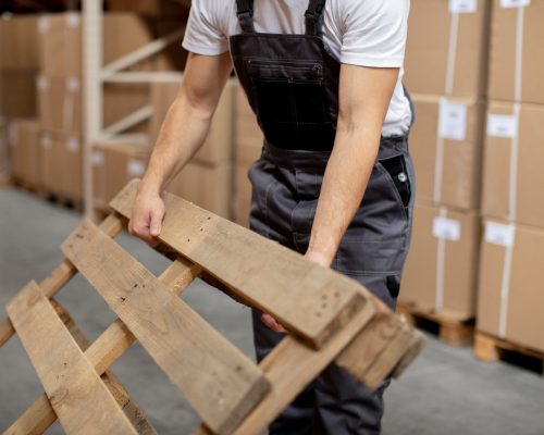 close-up-hands-holding-wooden-item_23-2149214236