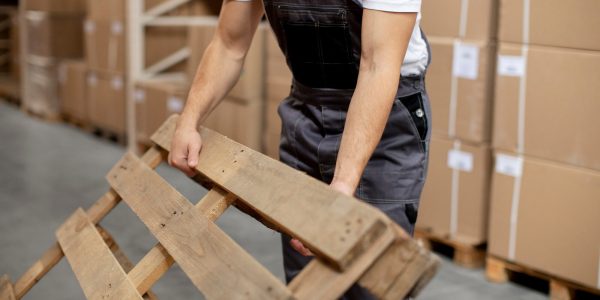 close-up-hands-holding-wooden-item_23-2149214236